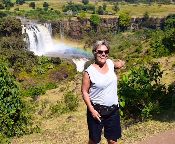 Woman in front of Blue Nile Falls in Bahir Dar