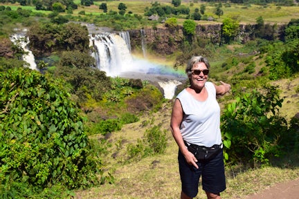 Woman in front of Blue Nile Falls in Bahir Dar